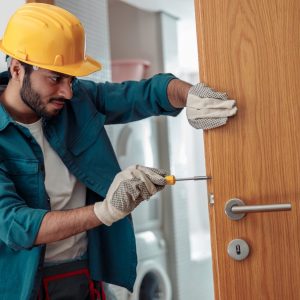 locksmith-technician-installing-door-knob-in-Augusta-GA